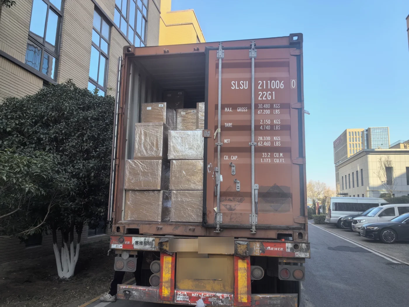 Container SLSU 211006 loaded with PoE switches ready for sea freight to Dar es Salaam